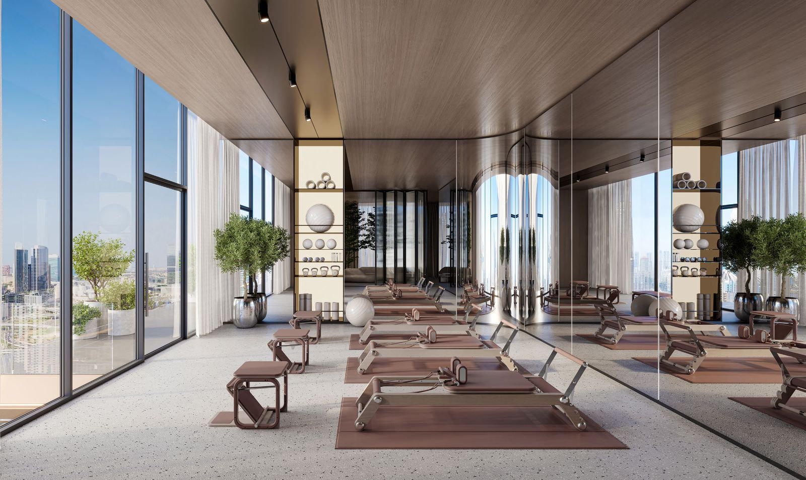 Pilates studio with reformer machines at Berkeley Tower