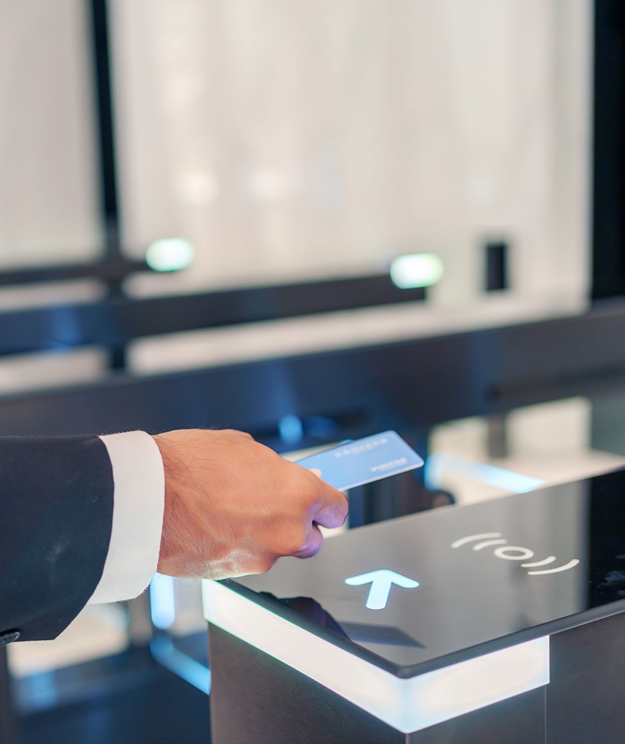 Smart access security gate in the Berkeley Tower lobby with a contactless card reader